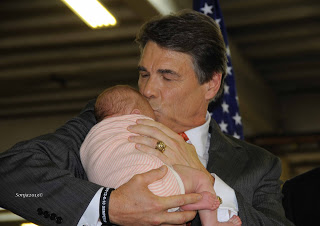 Rick Perry kissing baby