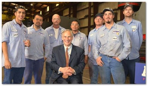 Greg Abbott with workers at Mach Industrial Group
