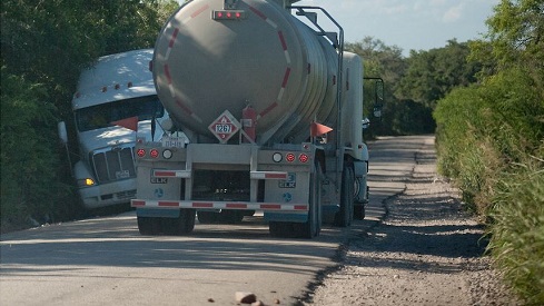 Combination of Heavy Trucks and Heavy Traffic Destroy Texas Roads