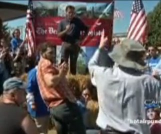 Mitt Romney Heckled by progressives at Iowa State Fair